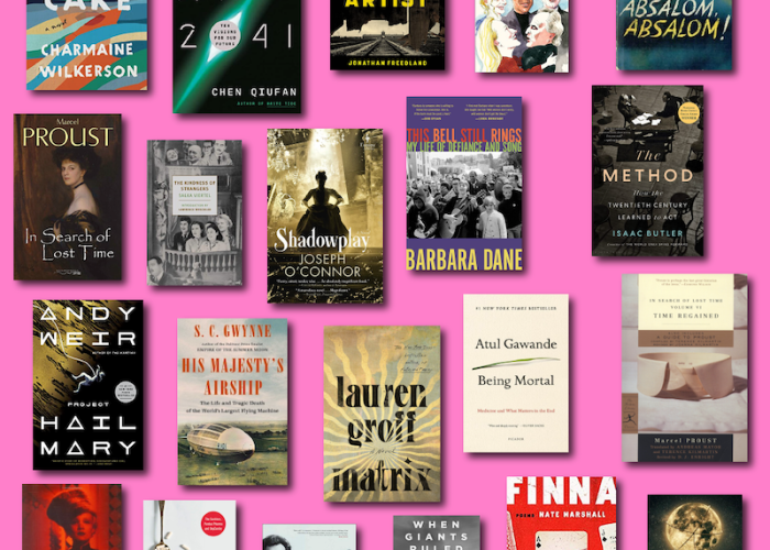 Book covers against bright pink background